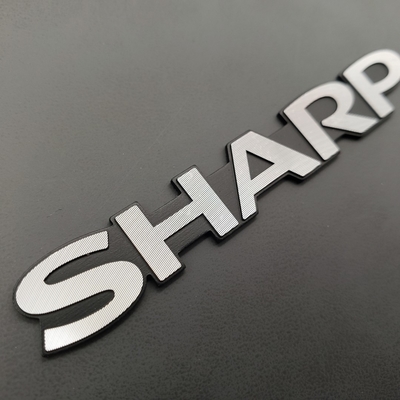 Logotipo de metal de níquel electroformado personalizado ecológico y personalización