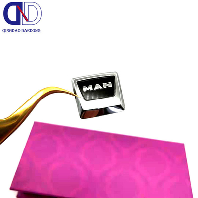 Producción a medida de pegatinas de logotipo metálicas de niquel electroformado para llaves de automóviles