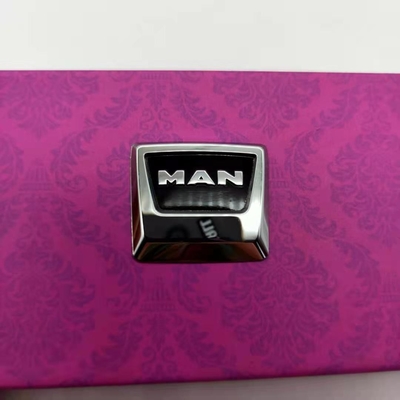Producción a medida de pegatinas de logotipo metálicas de niquel electroformado para llaves de automóviles